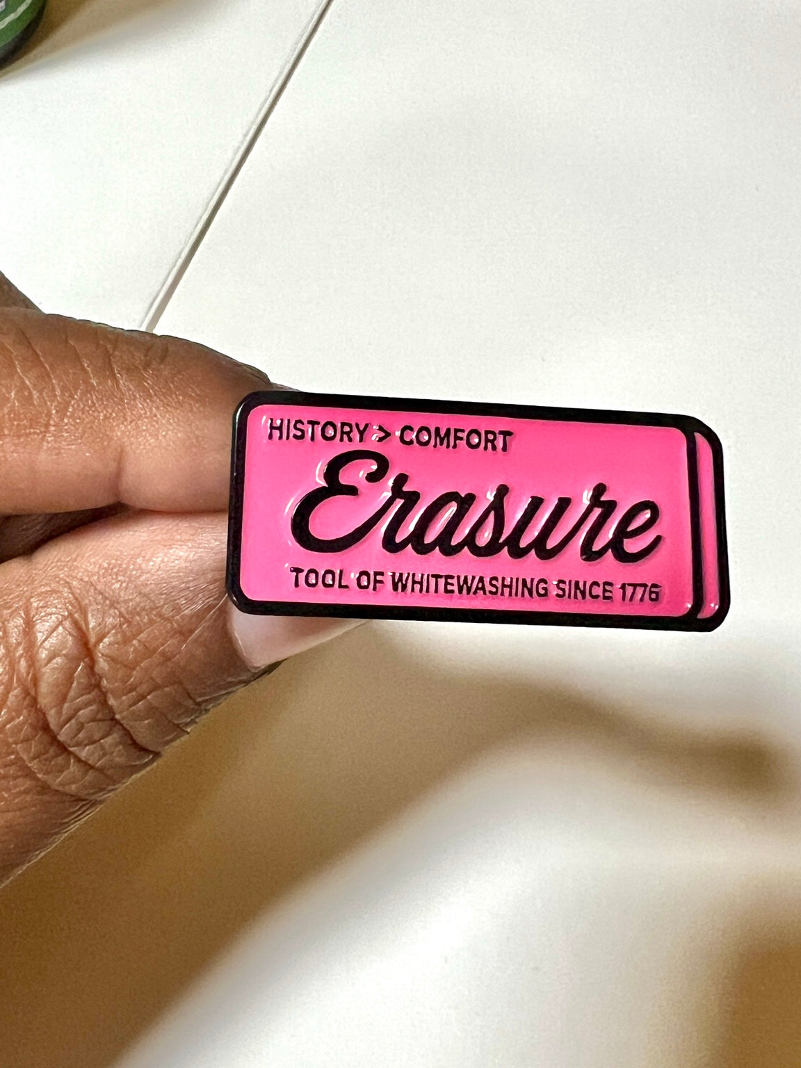 Erasure pink school eraser inspired enamel pin with History > Comfort message